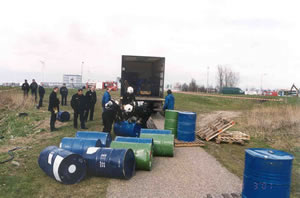 photo-jerry cans and drums in stolen truck
