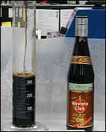 photo of "Havana Club" rum bottles containing a brown-colored liquid, that field-testing indicated contained heroin