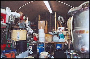 photo of chemicals found at the site, the operator was apparently converting safrole to isosafrole, oxidizing isosafrole to the corresponding phenylacetone, and using methylamine (probably produced from acetamide) to produce MDMA via an aluminum amalgam reduction.