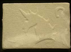 Each brick was 9 x 6 x 1.25 inches, white in color, and imprinted with both a unicorn (center) and a horseshoe (upper right corner) logo